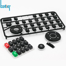 Teclado de goma con tapa de botón de plástico